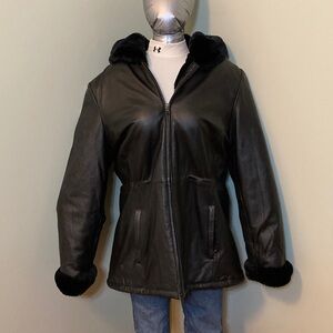 Elegant Black Leather Jacket with Fur Trim